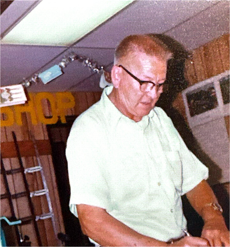 Roland "Paul" Oakley working in the original Village Key & Saw Shop
